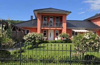 Haus kaufen in Grubnow 1b, 18569 Neuenkirchen, Ferienhaus in ruhiger Lage mit Wintergarten und Wasserblick!