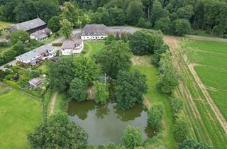 Gewerbeimmobilie kaufen in Brüggefeld 10, 37697 Lauenförde, Historischer Gasthof mit parkähnlichem Grundstück und privatem See