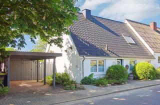 Doppelhaushälfte kaufen in 25746 Lohe-Rickelshof, Überraschend anders: Besondere Doppelhaushälfte mit Carport in Lohe-Rickelshof bei Heide