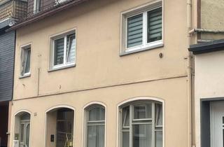 Mehrfamilienhaus kaufen in Mainzer Strasse 34, 55413 Trechtingshausen, Charmantes Mehrfamilienhaus mit zwei stilvollen Wohneinheiten und eine Gewerbefläche