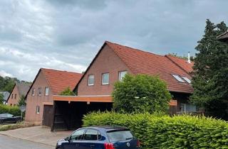 Wohnung kaufen in 31249 Hohenhameln, Hohenhameln - 4 Zimmer Dachgeschosswohnung mit Carport und Gartennutzung