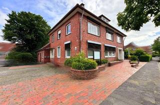 Mehrfamilienhaus kaufen in 26434 Wangerland, Renditeobjekt mit Charme: Ehemaliges Bankgebäude als Mehrfamilienhaus in Tettens/Wangerland