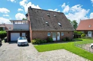 Haus kaufen in 26553 Dornum, Vielseitiges Wohnhaus mit Drei Einheiten in Ruhiger Lage