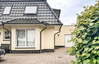 Wohnung kaufen in 27607 Langen, Stil trifft Garten - hochwertige Erdgeschosswohnung in begehrter Lage