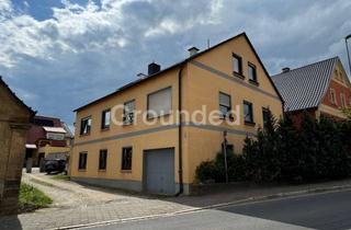 Mehrfamilienhaus kaufen in Bamberger Straße, 96148 Baunach, Charmantes Mehrfamilienhaus mit drei Wohneinheiten in Baunach