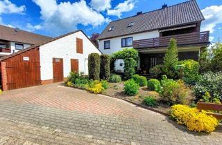 Mehrfamilienhaus kaufen in 28790 Schwanewede, Entfalten Sie Ihre Wohnträume in diesem schönen Zweifamilienhaus mit Dachterrasse, Carport, Garten und weiteren tollen Ausstattungsmerkmalen