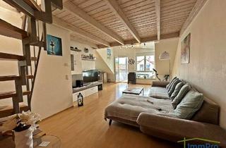 Wohnung kaufen in 71083 Herrenberg, Charmante 4-Zimmer Dachgeschosswohnung mit Balkon - vermietet