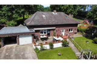 Haus kaufen in 23758 Gremersdorf, EFH zur Modernisierung mit Kachelofen, Süd- West Terrasse und Doppelgarage in grüner Ortslage
