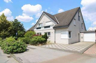 Doppelhaushälfte kaufen in 46539 Dinslaken, Zögern Sie nicht: Gepflegte Doppelhaushälfte mit Garten und Garage