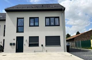 Wohnung kaufen in 52445 Titz, Ideale Kapitalanlage/Chice moderne Erdgeschosswohnung mit Terrasse und Garten; PKW-Stellplatz