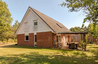 Doppelhaushälfte kaufen in 21441 Garstedt, Modernisierte Doppelhaushälfte mit Carport in gefragter Wohnlage