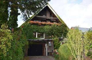 Einfamilienhaus kaufen in 25821 Breklum, Einfamilienhaus mit Teilkeller und Garage