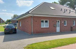 Doppelhaushälfte kaufen in 26629 Strackholt, Doppelhaushälfte, Bungalow in schöner Siedlungslage mit Ausbaureserve