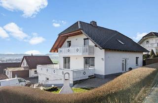 Haus kaufen in 35119 Rosenthal, Rosenthal - Zweifamilienhaus mit Einliegerwohnung in toller Lage