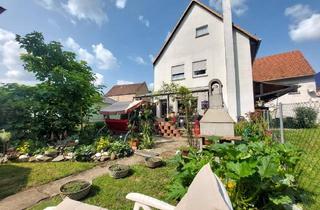 Wohnung kaufen in 63667 Nidda, Nidda - Ihr modernes Zuhause mit Wohlfühlgarantie in idyllischer Lage mit sonnigem Garten