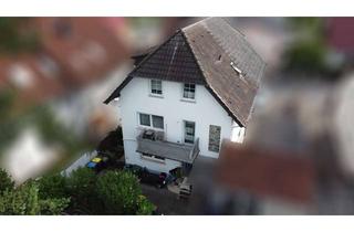 Wohnung kaufen in 61206 Wöllstadt, Geräumige 4-Zimmer-Maisonette-Wohnung mit Balkon & Gartennutzung in Nieder-Wöllstadt