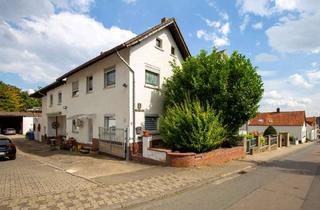 Einfamilienhaus kaufen in 55270 Essenheim, Flexibles Einfamilienhaus mit zwei separaten Apartments und Partykeller