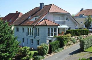 Wohnung kaufen in 34414 Warburg, Warburg - Traumhafte Dachgeschoss-Eigentumswohnung mit Panoramablick auf Warburg