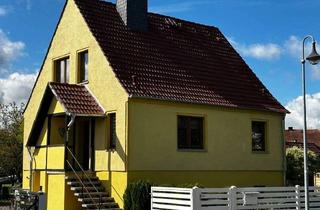 Einfamilienhaus kaufen in 39524 Sandau, Einfamilienhaus mit Terrasse, Kamin, Doppelgarage und kleinem Bungalow