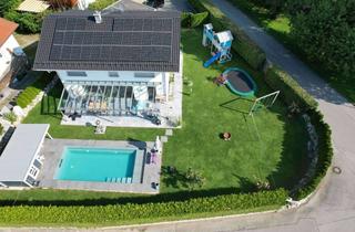 Einfamilienhaus kaufen in 83075 Bad Feilnbach, Modernes Einfamilienhaus mit Pool in sonnigster Lage und Bergblick auf den Wendelstein.