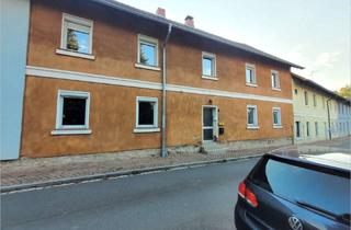 Wohnung kaufen in 38173 Erkerode, Erdgeschosswohnung mit großem Renovierungsbedarf in ruhiger Lage