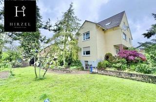 Mehrfamilienhaus kaufen in 65479 Raunheim, Gepflegtes, gut vermietetes Mehrfamilienhaus in Raunheimer Waldlage