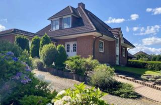 Haus kaufen in 22946 Grande, Im Grünen: Gepflegtes Walmdachhaus mit Doppelgarage, 60 m² Terrasse und großzügiger Nutzfläche