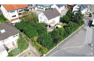 Haus kaufen in 96193 Wachenroth, Charmantes Zweifamilienhaus mit großem Grundstück und idyllischem Garten