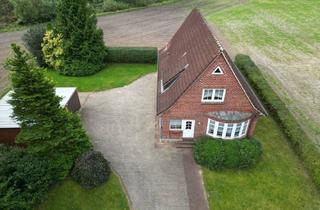 Einfamilienhaus kaufen in 25712 Brickeln, Brickeln - Einfamilienhaus mit Charakter - Großzügiges Grundstück in ruhiger Lage