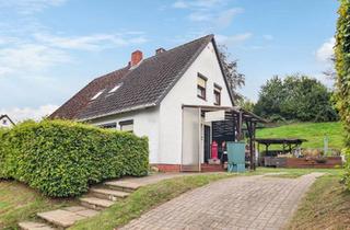 Doppelhaushälfte kaufen in 27721 Ritterhude, Vermietete Doppelhaushälfte mit Doppelcarport und Garage in Ritterhude