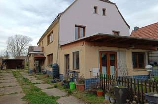 Einfamilienhaus kaufen in 06632 Baumersroda, Großes Grundstück mit teilsaniertem Einfamilienhaus