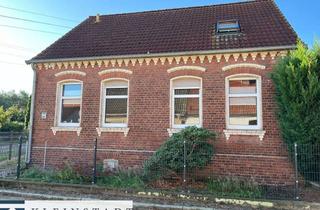 Haus kaufen in 39524 Sandau, Schönes Backsteinhaus mit großer Garage in Sandau