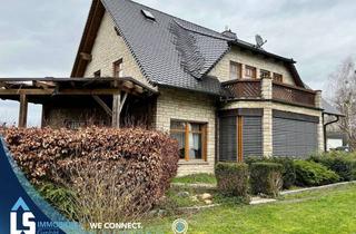 Haus kaufen in 39596 Hohenberg-Krusemark, Exklusives Traumhaus mit Naturstein-Fassade, Pool, Garage und separatem Büro – Luxus pur!