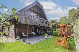 Haus kaufen in Kathenwiese 2B, 24576 Weddelbrook, Sofort wohlfühlen: Charmantes Holzhaus mit Garten, Terrasse und Loggia in Weddelbrook