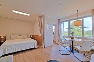 Wohnung kaufen in 96476 Bad Rodach, Ihr Rückzugsort im Grünen: Modernes 1,5-Zimmer-Apartment mit Blick auf den Kurpark und Wellness vor