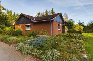 Einfamilienhaus kaufen in 24401 Böel, Lichtdurchfluteter Winkelbungalow mit großzügigem Grundstück