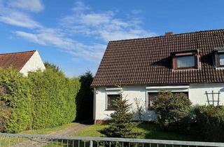 Haus kaufen in 21493 Schwarzenbek, Modernisierungsbedürftige DHH mit Teilkeller und großem Grundstück in beliebter Ortslage