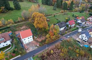 Grundstück zu kaufen in 63869 Heigenbrücken, Einzigartige Aussicht: Panoramagrundstück am Hang für Ihr Traumhaus