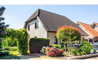 Einfamilienhaus kaufen in 49577 Eggermühlen, Eggermühlen - Charmantes Einfamilienhaus mit Garten, Terrasse, Garage, EBK und Kamin in ruhiger Lage!