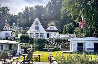 Einfamilienhaus kaufen in 24306 Bösdorf, Bösdorf - Reetdachhaus mit Wassergrundstück am Dieksee