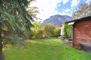 Reihenhaus kaufen in 82467 Garmisch-Partenkirchen, Kompakt & charmant: 2-Zi. Reihenhaus mit Garten, Bergblick & Modernisierungspotenzial!