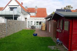 Doppelhaushälfte kaufen in 23746 Kellenhusen, Kellenhusen - Doppelhaushälfte mit großem Wintergarten, Kamin und Garage in ruhiger, strandnaher Lage!