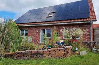 Einfamilienhaus kaufen in 26759 Hinte, Hinte - Haus mit neuer Heizung und PV an der Nordsee in Sackgassenlage