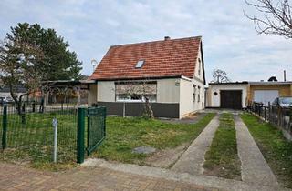 Einfamilienhaus kaufen in 14728 Rhinow, Rhinow - Einfamilienhaus in Rhinow mit Garten & Garagen