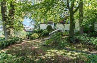 Haus kaufen in 49549 Ladbergen, Stilvoller Architekten-Bungalow mit großem Garten