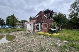 Grundstück zu kaufen in 26388 Fedderwarden, Baugrundstück mit moderner Schwimmhalle