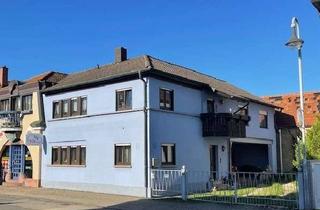 Haus kaufen in 76287 Rheinstetten, EFH mit Einliegerwohnung und Garagen in zentraler Lage