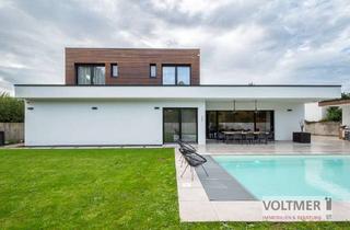 Villa kaufen in 66539 Neunkirchen, EINTAUCHEN - exklusive Villa mit Salzwasserpool und drei Garagen in Kohlhof!