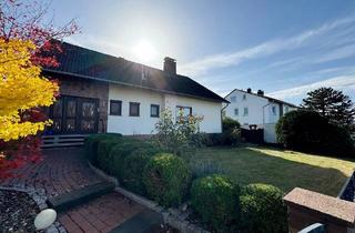 Einfamilienhaus kaufen in 34225 Baunatal, Baunatal - Charmantes Einfamilienhaus mit Wintergarten und Ausbaupotenzial in Baunatal-Hertingshausen