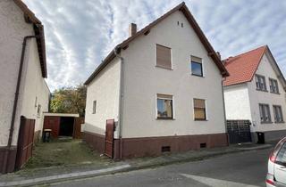 Einfamilienhaus kaufen in 65451 Kelsterbach, Einfamilienhaus mit großem Potenzial – Sanierung oder Neubau in Kelsterbach